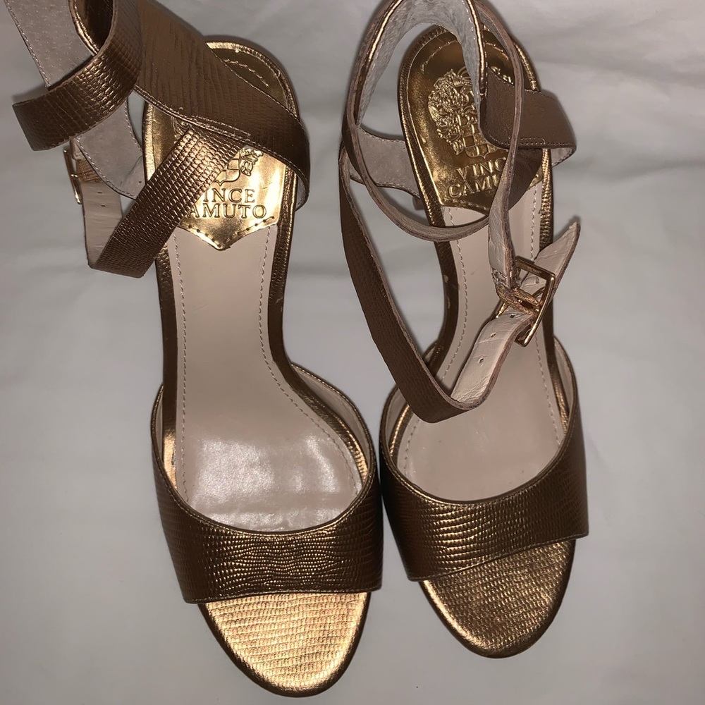 Gold high heel pumps
